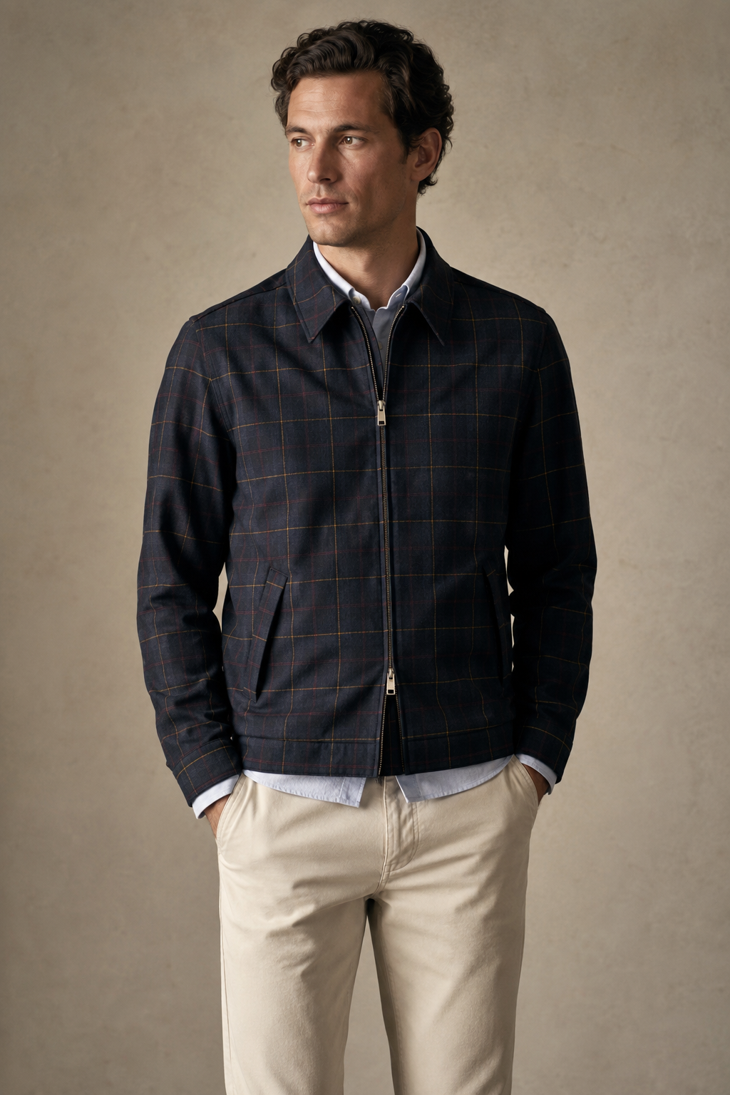 Man wearing Drake's Waxed Madras Tennis Blouson Jacket in navy blue