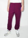 The North Face X Kaws Track Pants In Purple