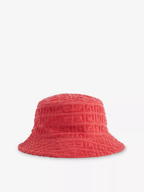 A red Givenchy terry cloth bucket hat with a all-over brand-jacquard design.