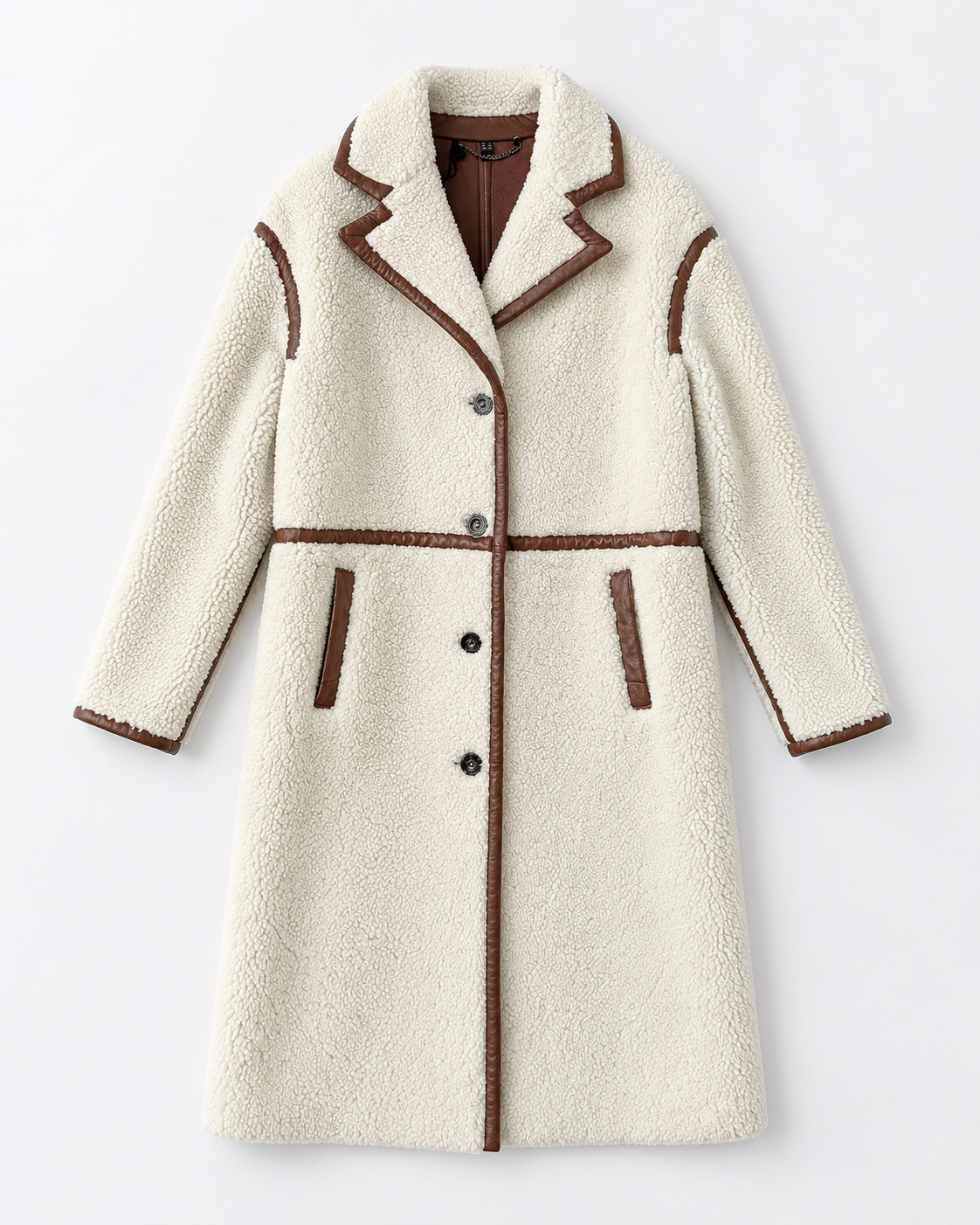 Belstaff Airstream Women’s Shearling Coat An off-white sherpa fleece coat with brown contrast trim, featuring a notched lapel, button closure, and front pockets, shown against a plain light gray background.