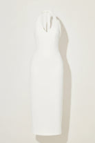 white odd muse dress against a plain background