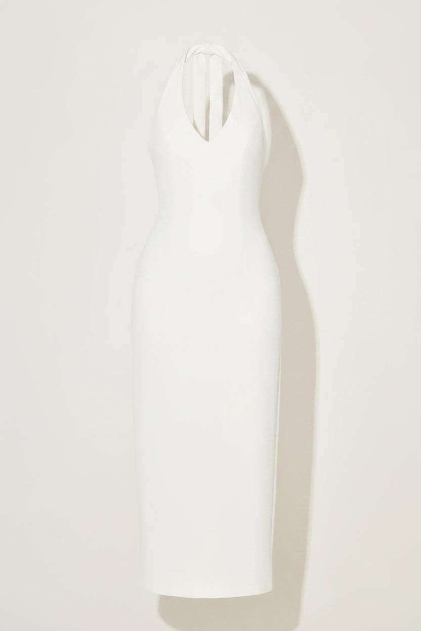 white odd muse dress against a plain background
