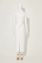 odd muse white strapless dress with a high slit on mannequin against a plain background