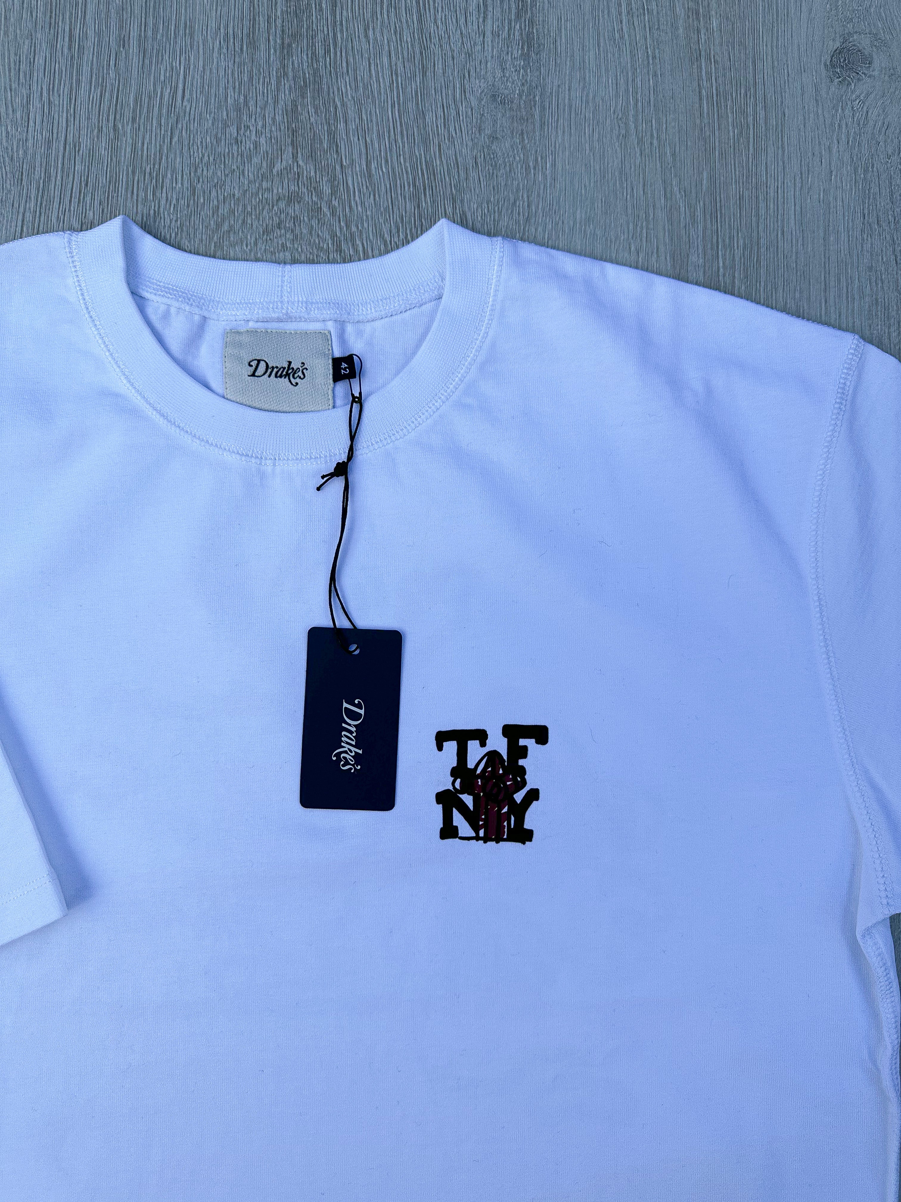 Drake's X Throwing Fits White Print Tee Shirt - House Of Huntington