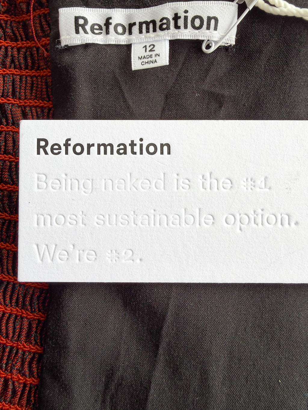 Reformation Giorgia Trägerloses Oberteil aus rotem Blumen-Jacquard