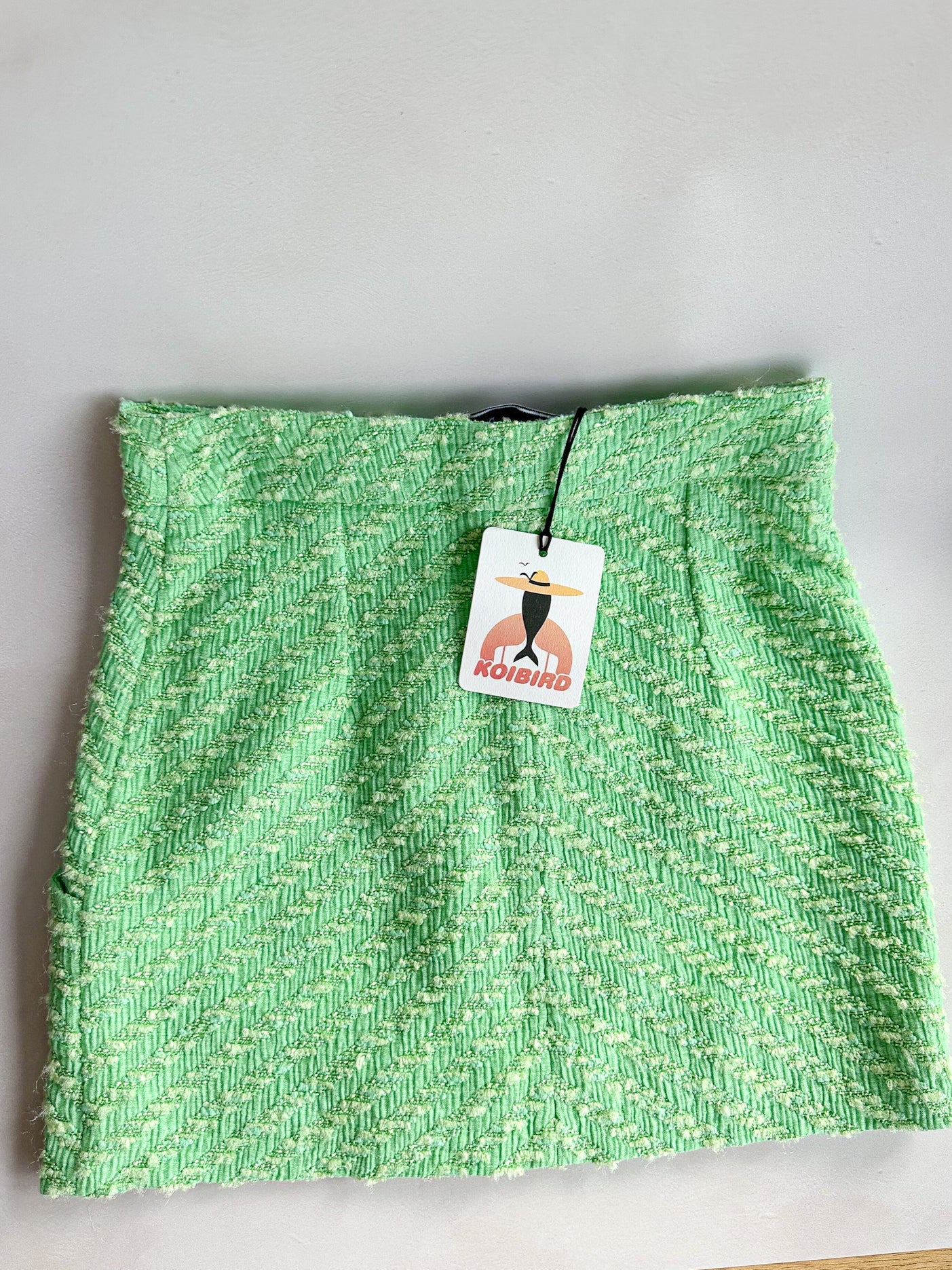Mini-jupe en tweed vert Rowen Rose