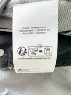 Mini-jupe Ganni grise preppy à ourlet plissé et patch logo