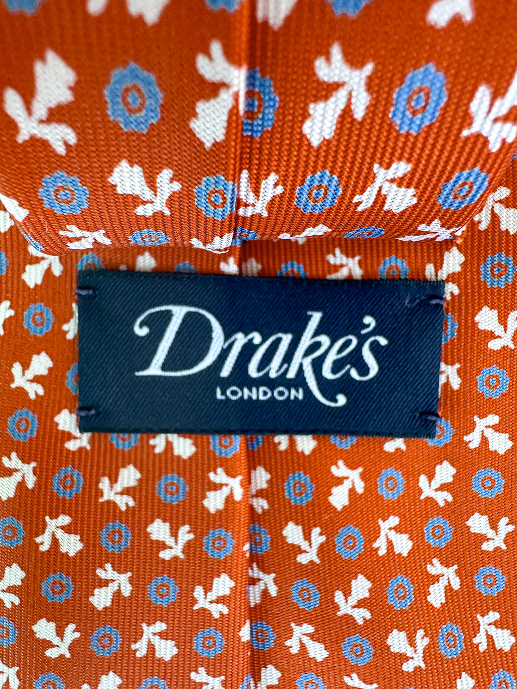 Drake's Seidenkrawatte mit geometrischem Blumenmuster in gebranntem Orange