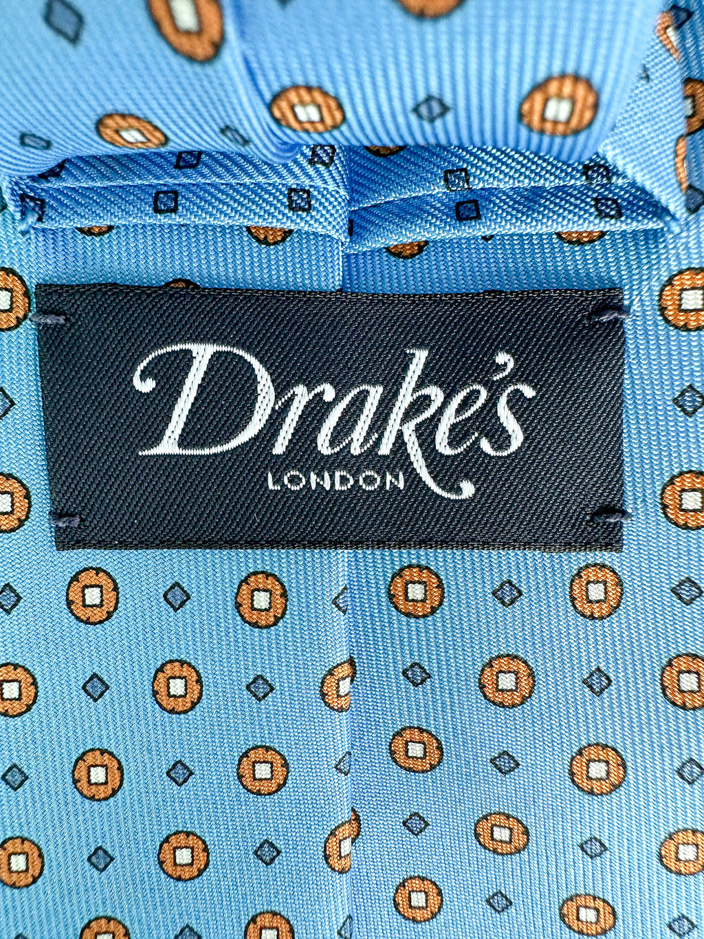 Drake's Seidenkrawatte mit blauem Kreis-Diamant-Print