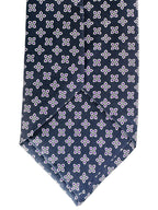 Drake's Marineblaue Seidenkrawatte mit lila Blumenblättern