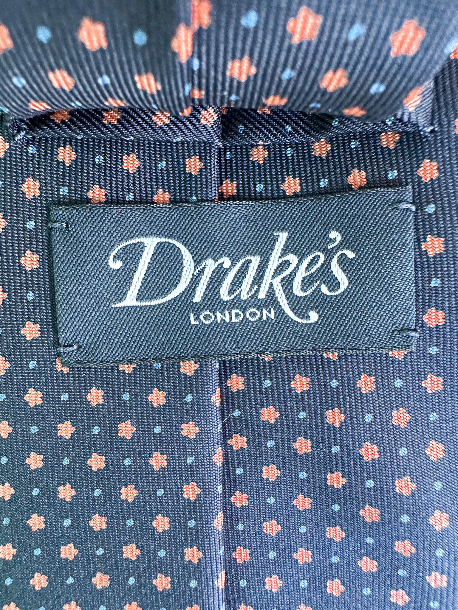 Drake's Navy Silk Tie With Orange Dot Floral