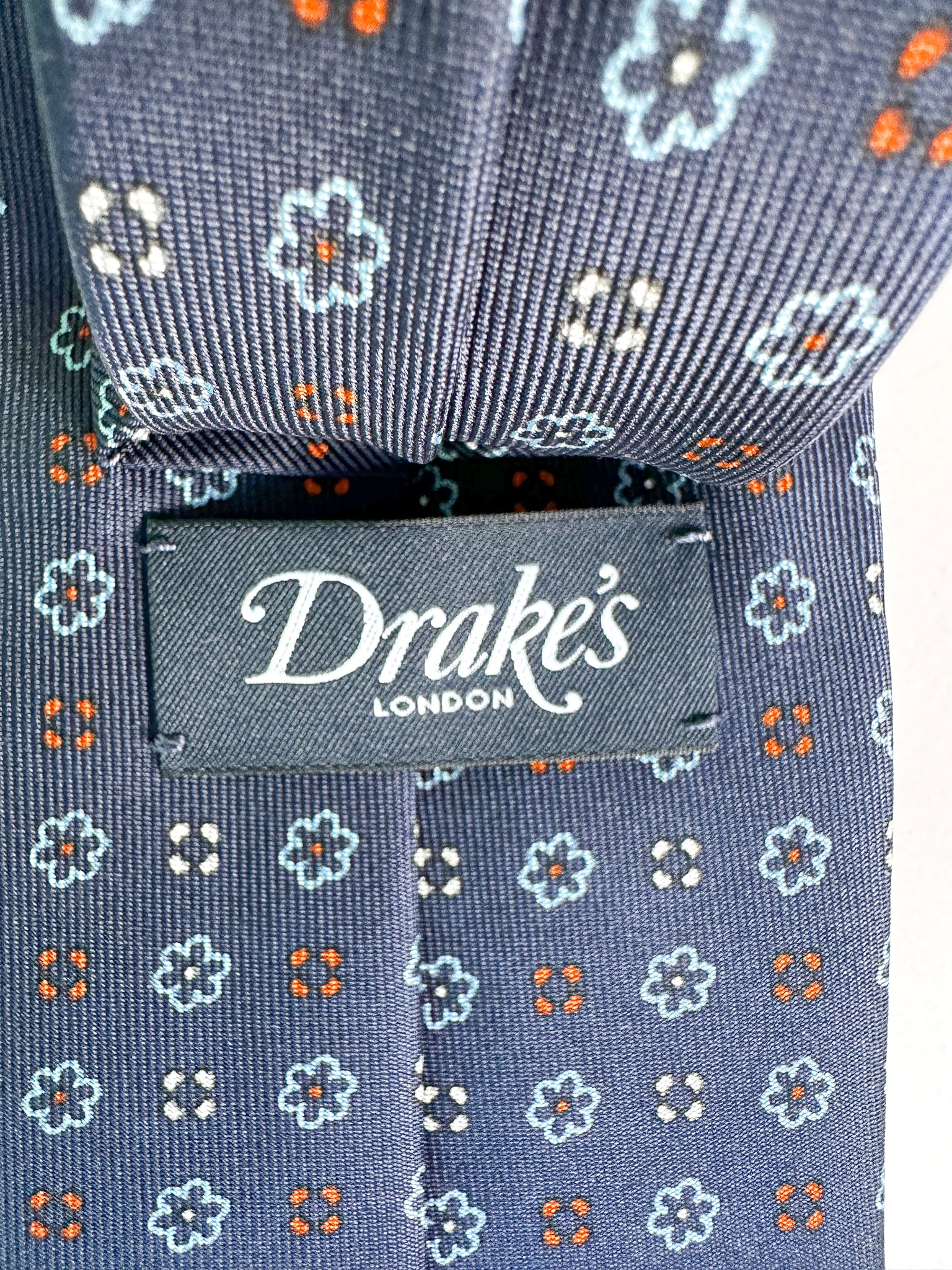 Drake's Navy Silk Tie With Blue Stencil Floral Design