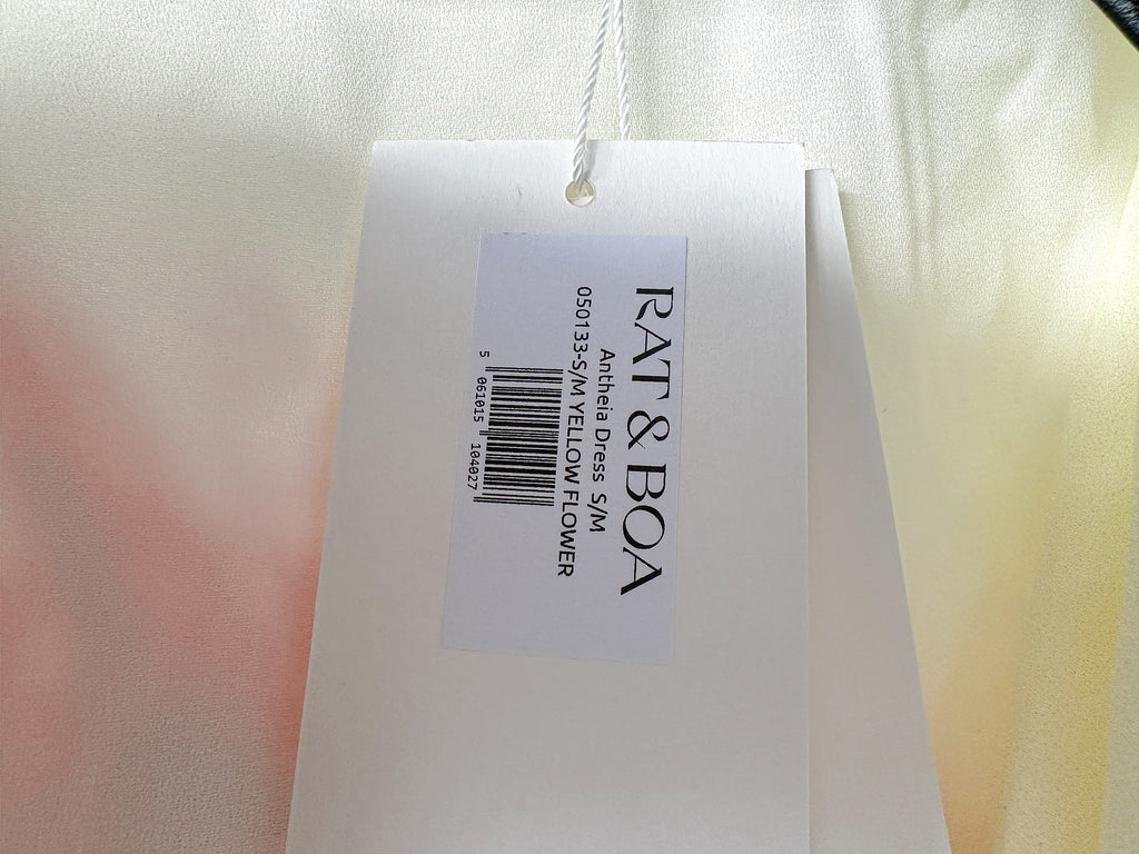 Trägerloses Maxikleid mit Orchideen-Print und Gürteldetail auf der Rückseite – Rat and Boa