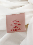 Robe de mariée Anaisa en taffetas ivoire à col montant Roksanda