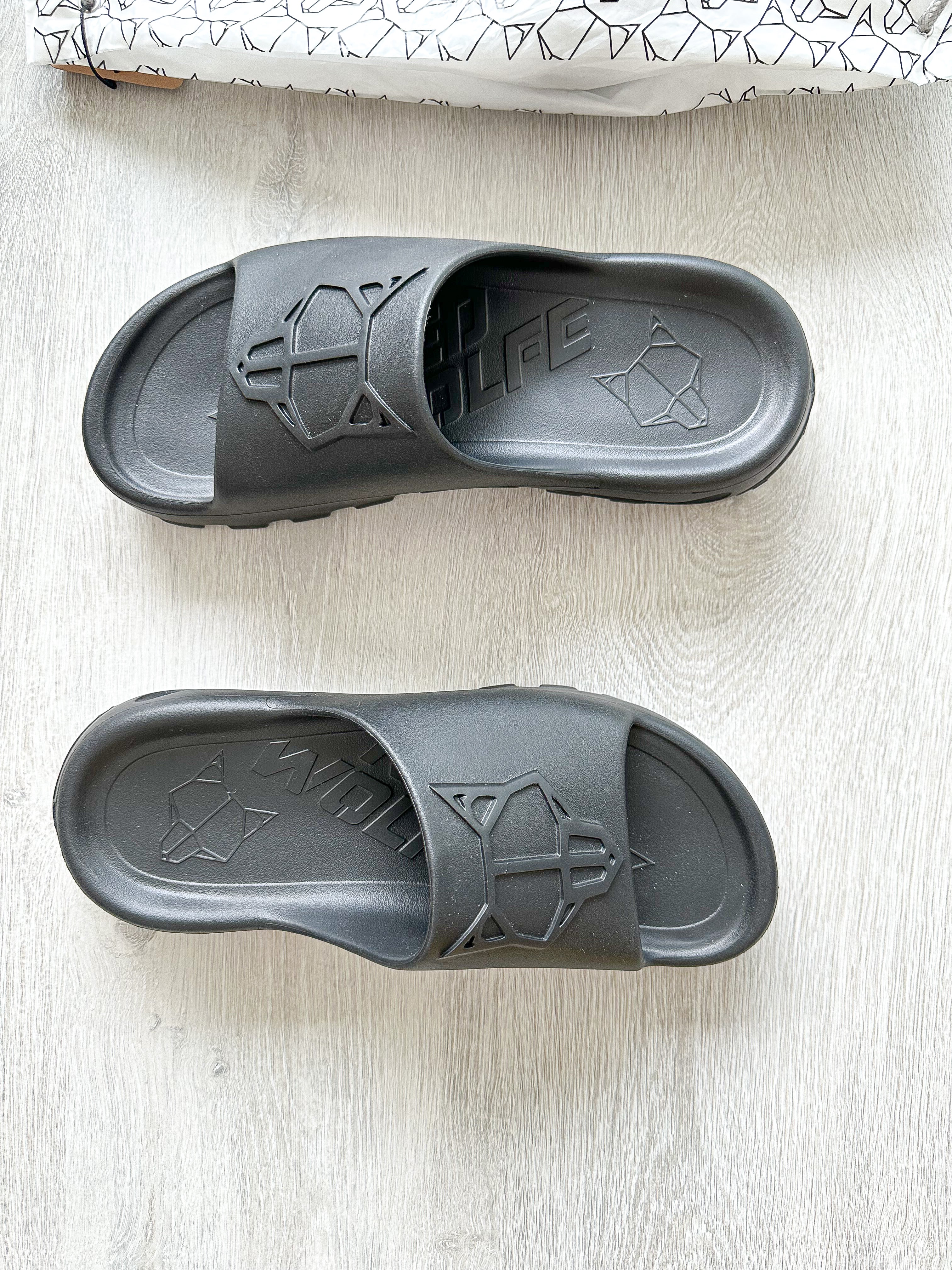 NAKED WOLFE Black Tommy Wold Embossed Waterproof Sandals Slides - House Of Huntington