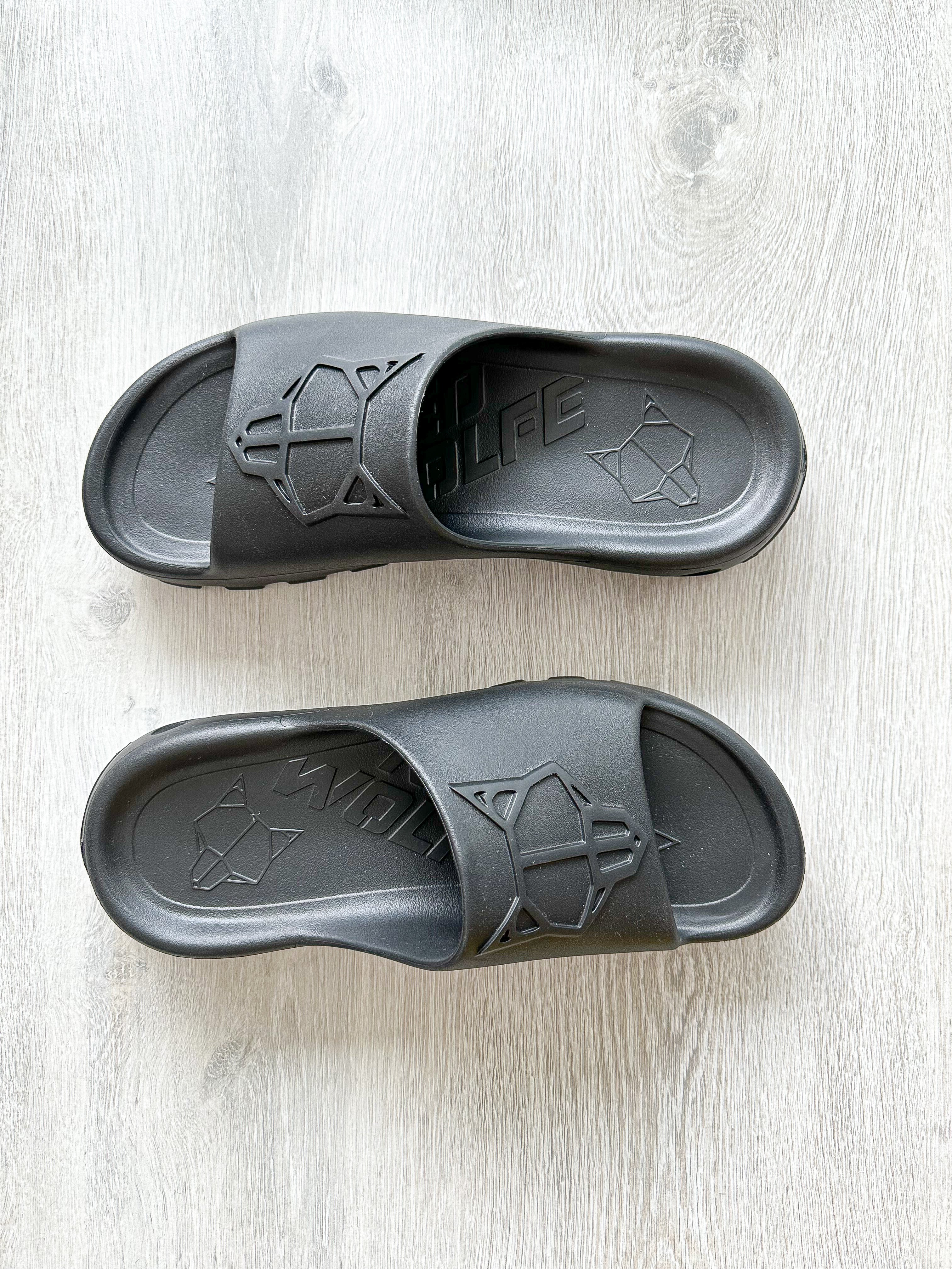 NAKED WOLFE Black Tommy Wold Embossed Waterproof Sandals Slides - House Of Huntington