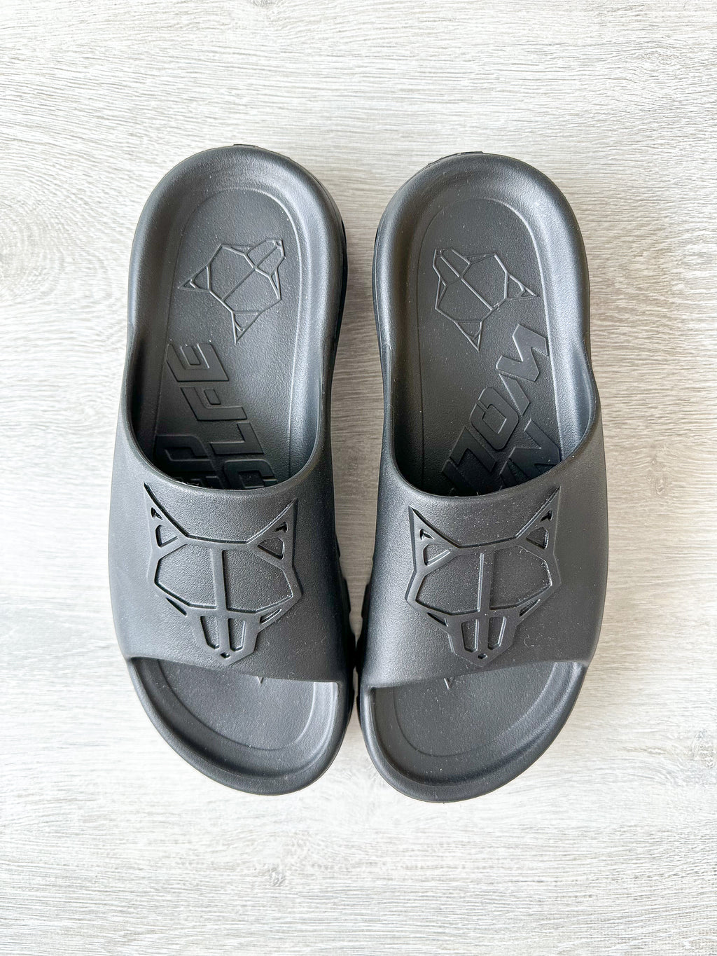 NAKED WOLFE Black Tommy Wold Embossed Waterproof Sandals Slides - House Of Huntington