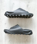 NAKED WOLFE Black Tommy Wold Embossed Waterproof Sandals Slides - House Of Huntington