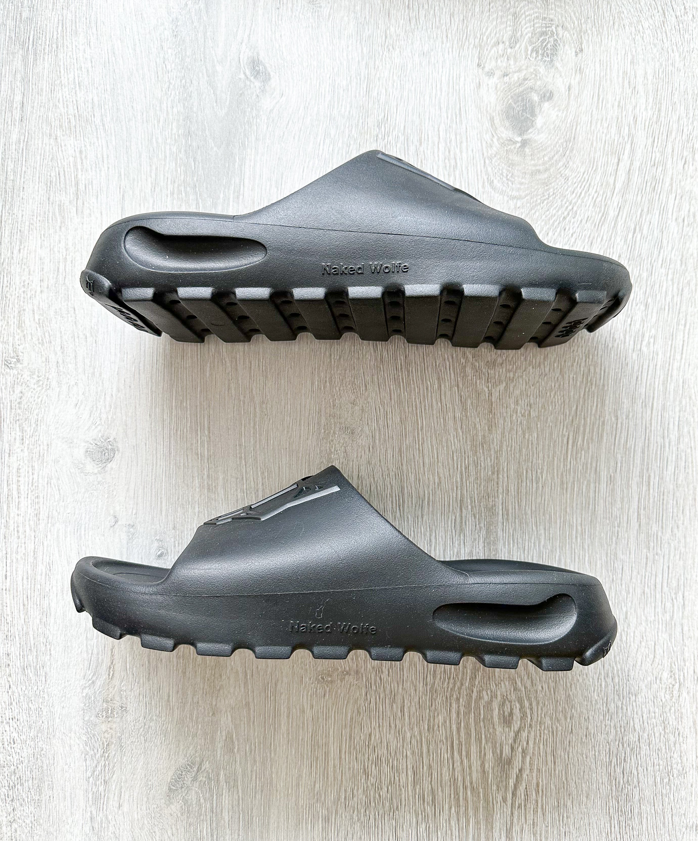 NAKED WOLFE Black Tommy Wold Embossed Waterproof Sandals Slides - House Of Huntington