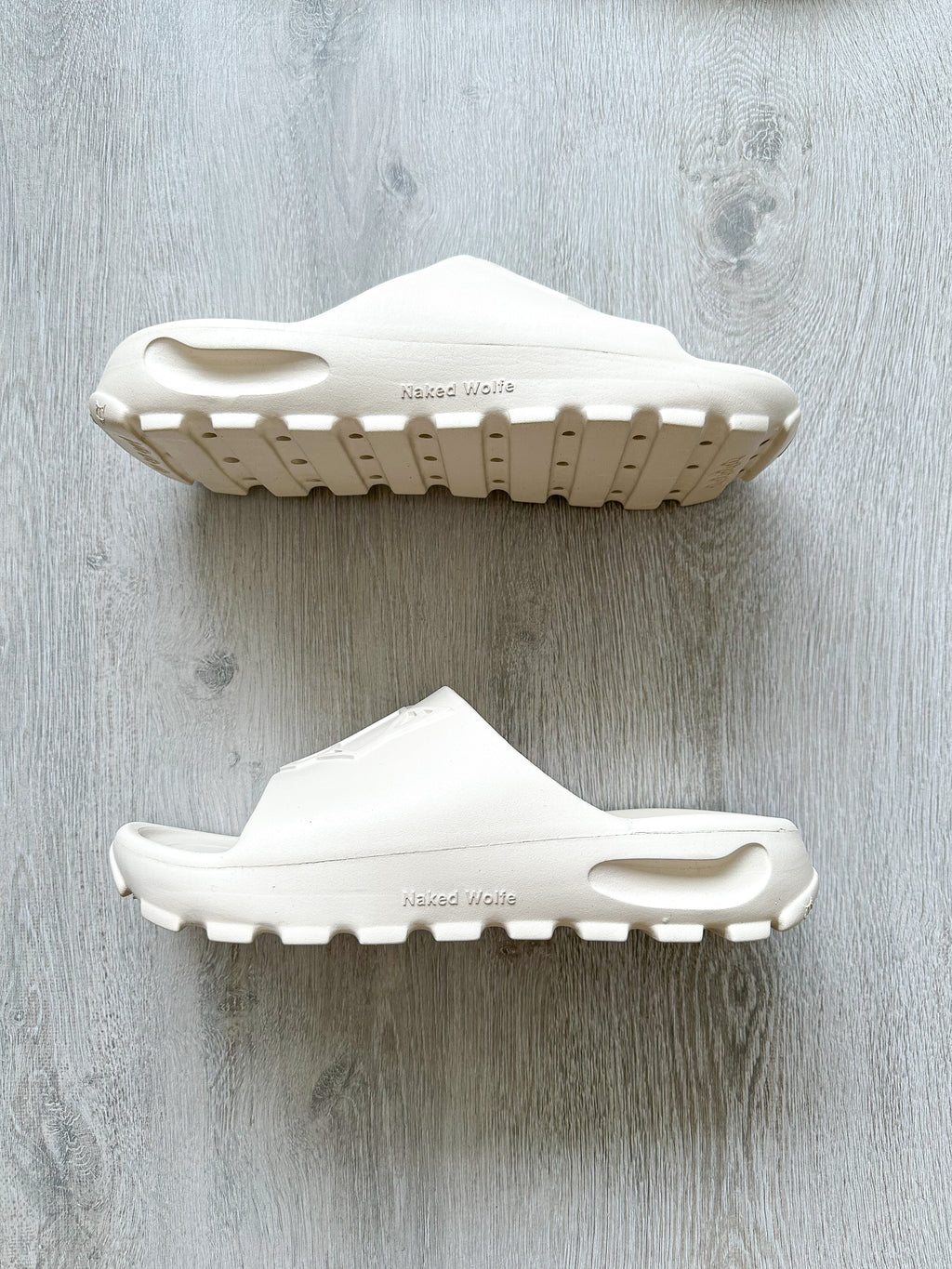 NAKED WOLFE Tommy Stone Cream Waterproof Wolf Embossed Sandals Slide - House Of Huntington