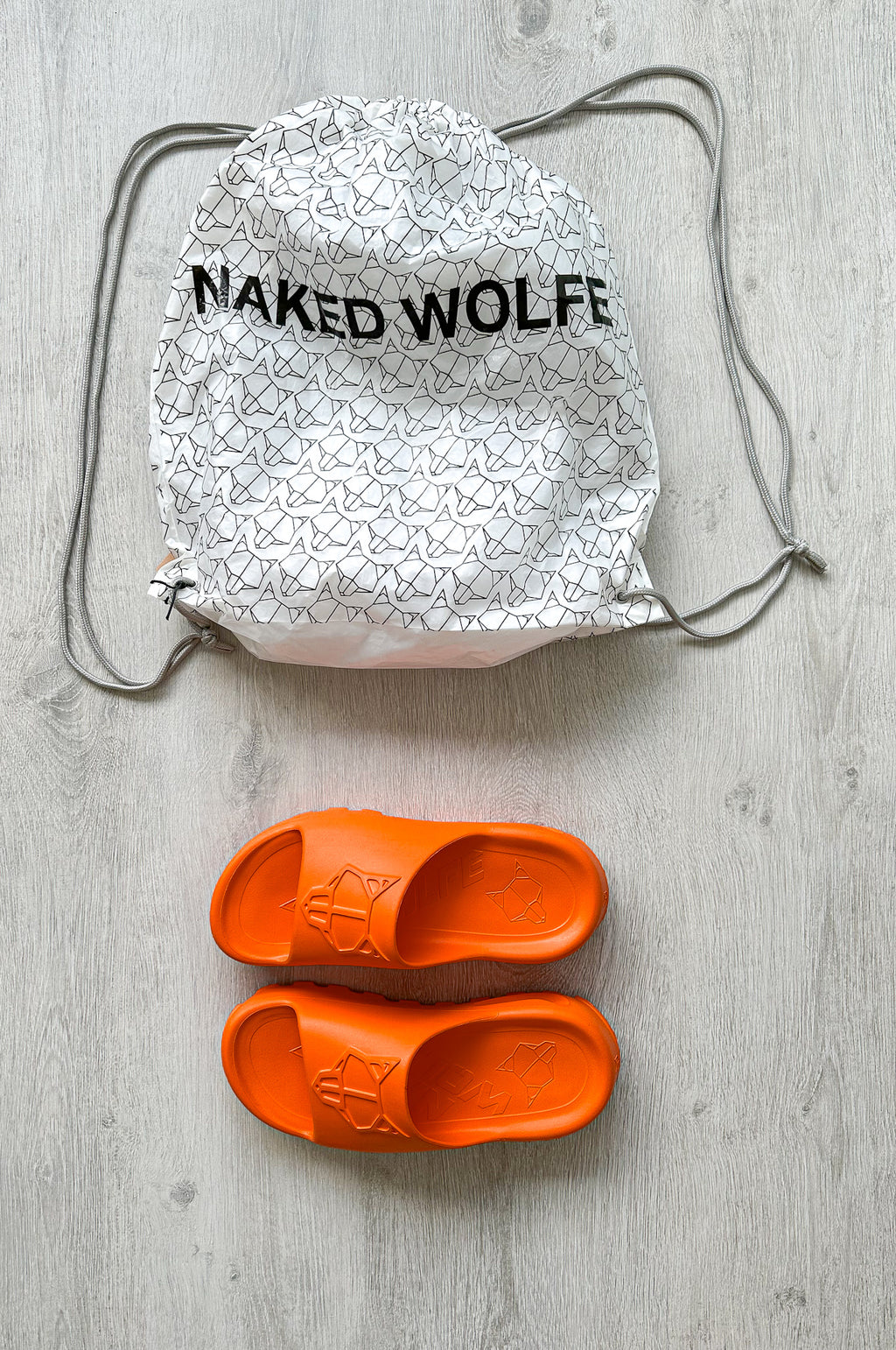 NAKED WOLFE Orange Tommy Waterproof Wolf Embossed Sandals - House Of Huntington