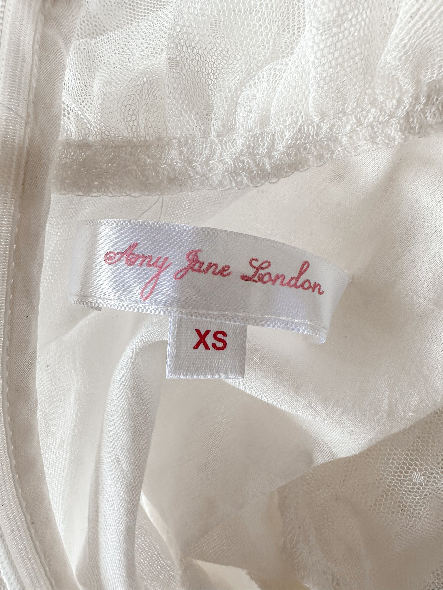 Amy Jane London White Long Sleeve Ruffle Tiered Detail Flared Evalina Mini Dress - House Of Huntington