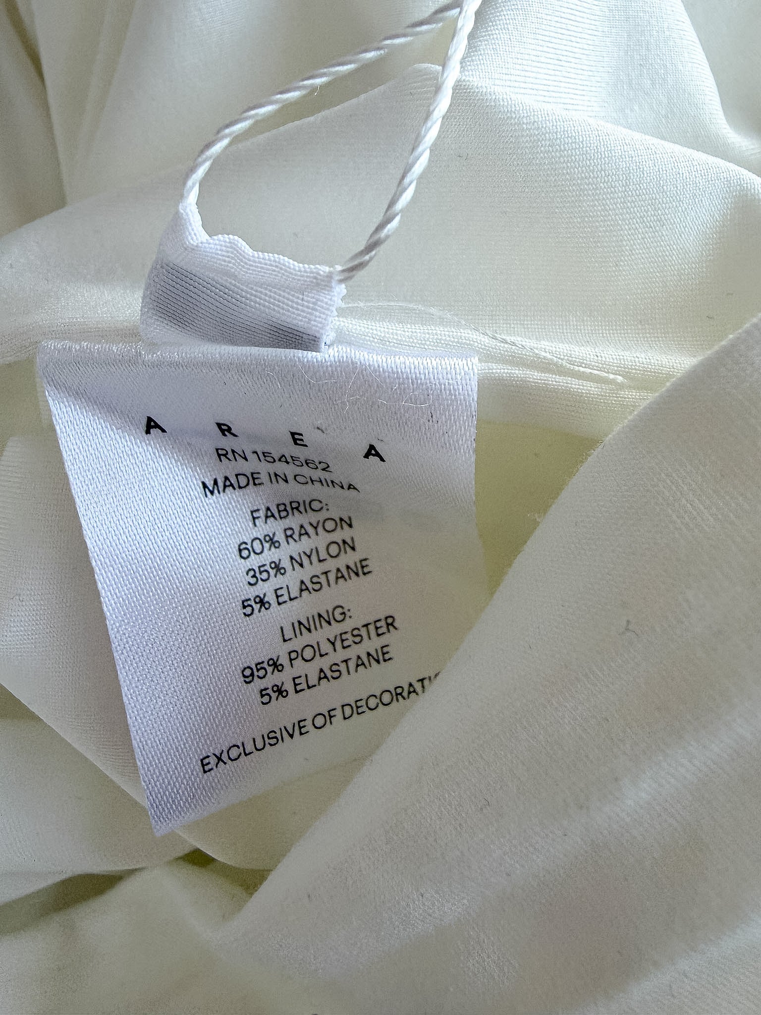 Area NYC White Heart Ring Ruched Mini Dress