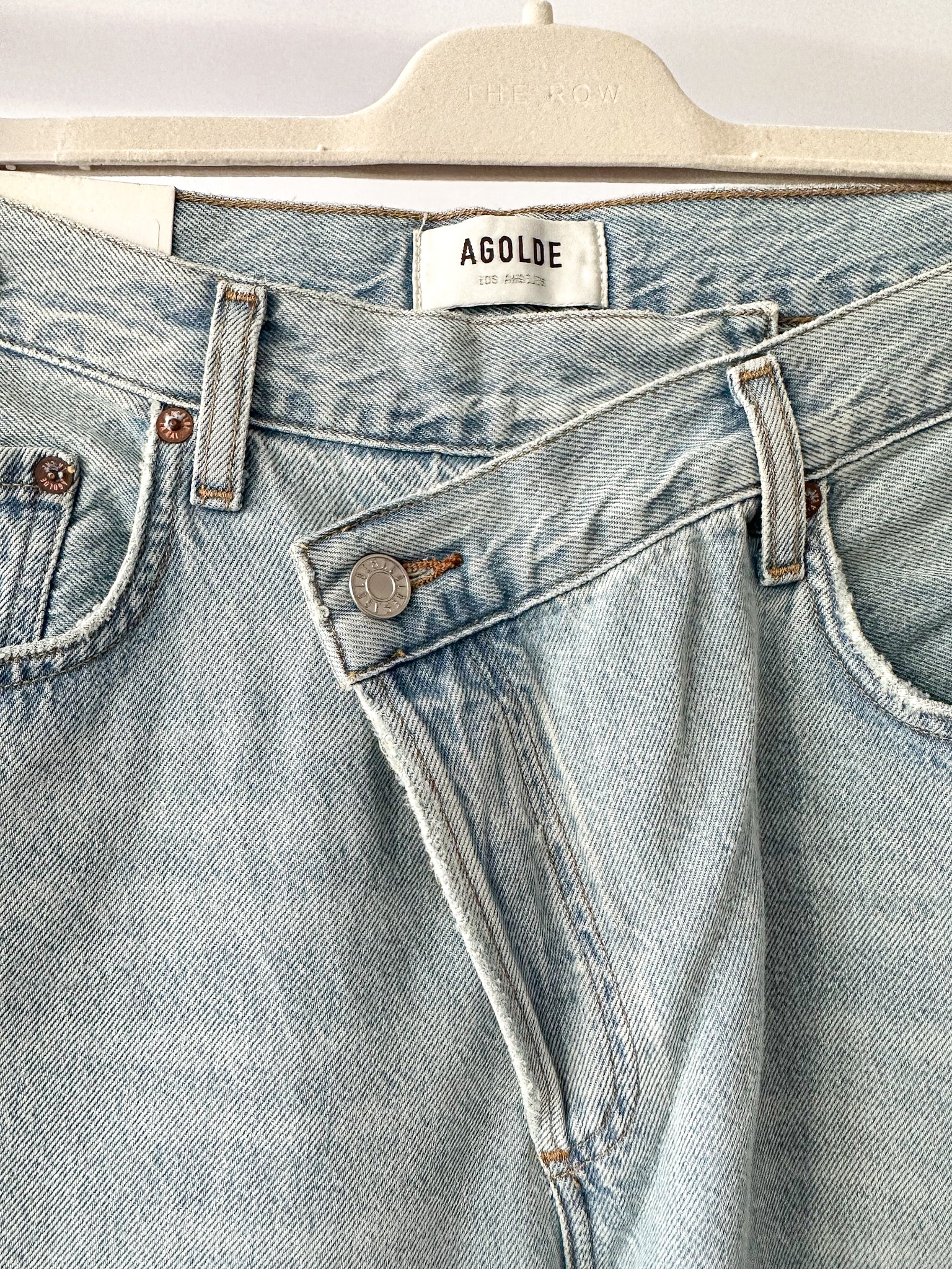 Agolde Criss Cross Hellblaue Denim-Jeans