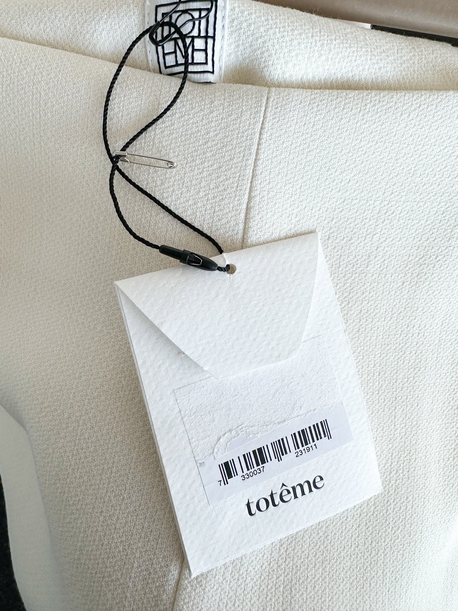 Pantalon large blanc épuré Toteme