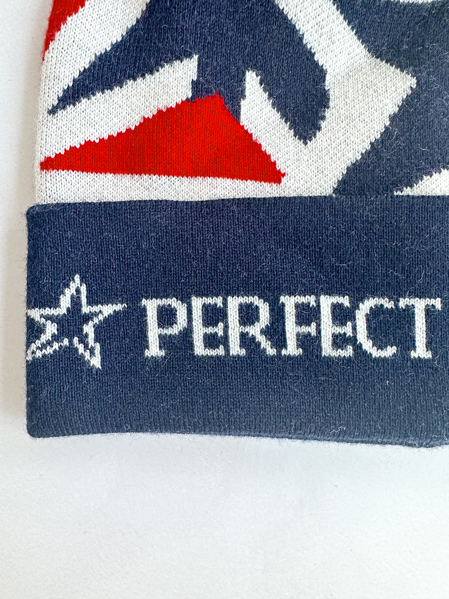 Perfect Moment Bobble Knit Ski Star Print Logo Beanie Hat