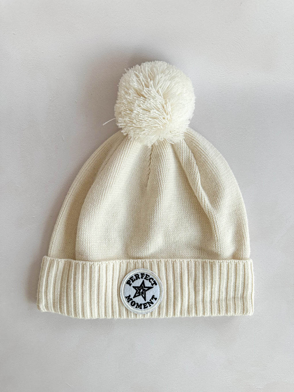 Perfect Moment Patch Ii Pompom Embellished Appliquéd Wool Beanie