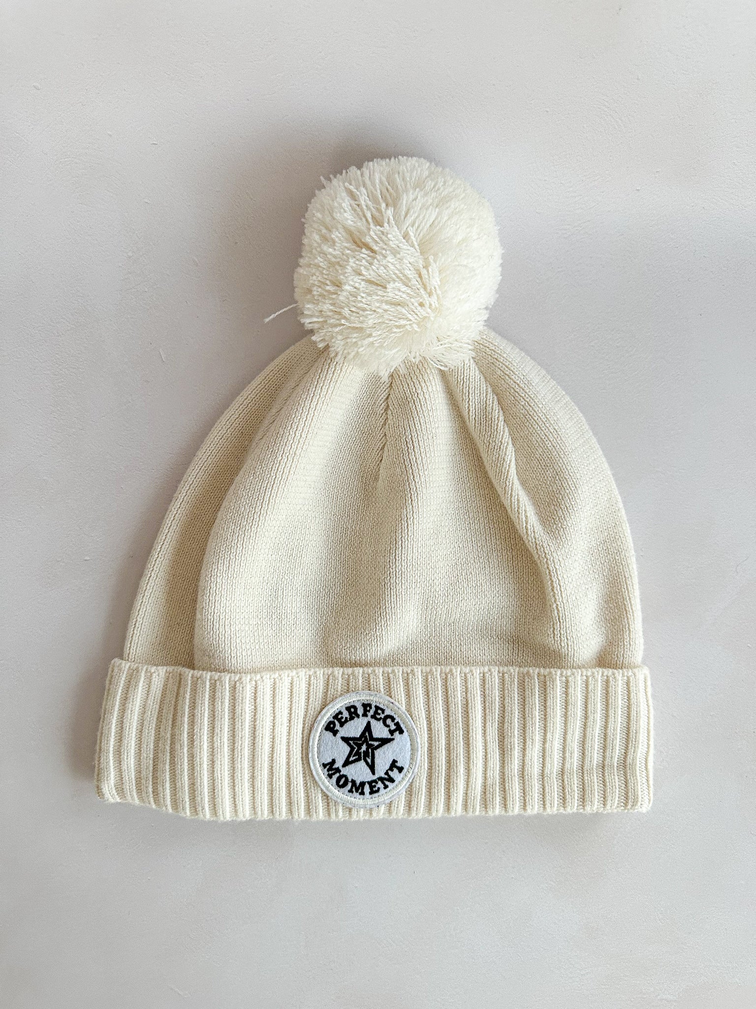 Perfect Moment Patch Ii Pompom Embellished Appliquéd Wool Beanie