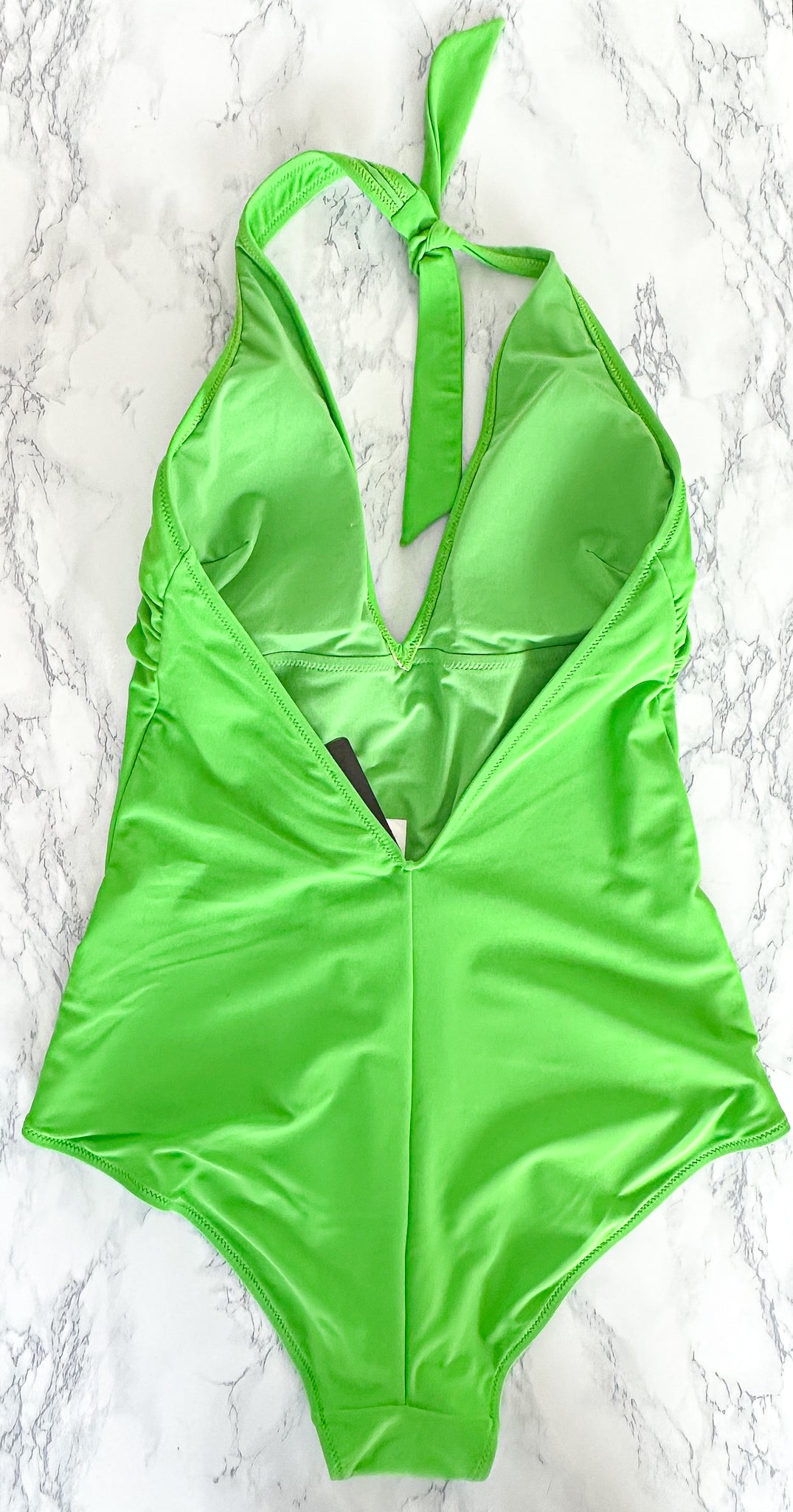 Maillot de bain une pièce vert à décolleté plongeant et dos nu Marina Rinaldi