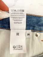 Mini-jupe en jean à grand logo Jean Paul Gaultier Haute Jeanerie