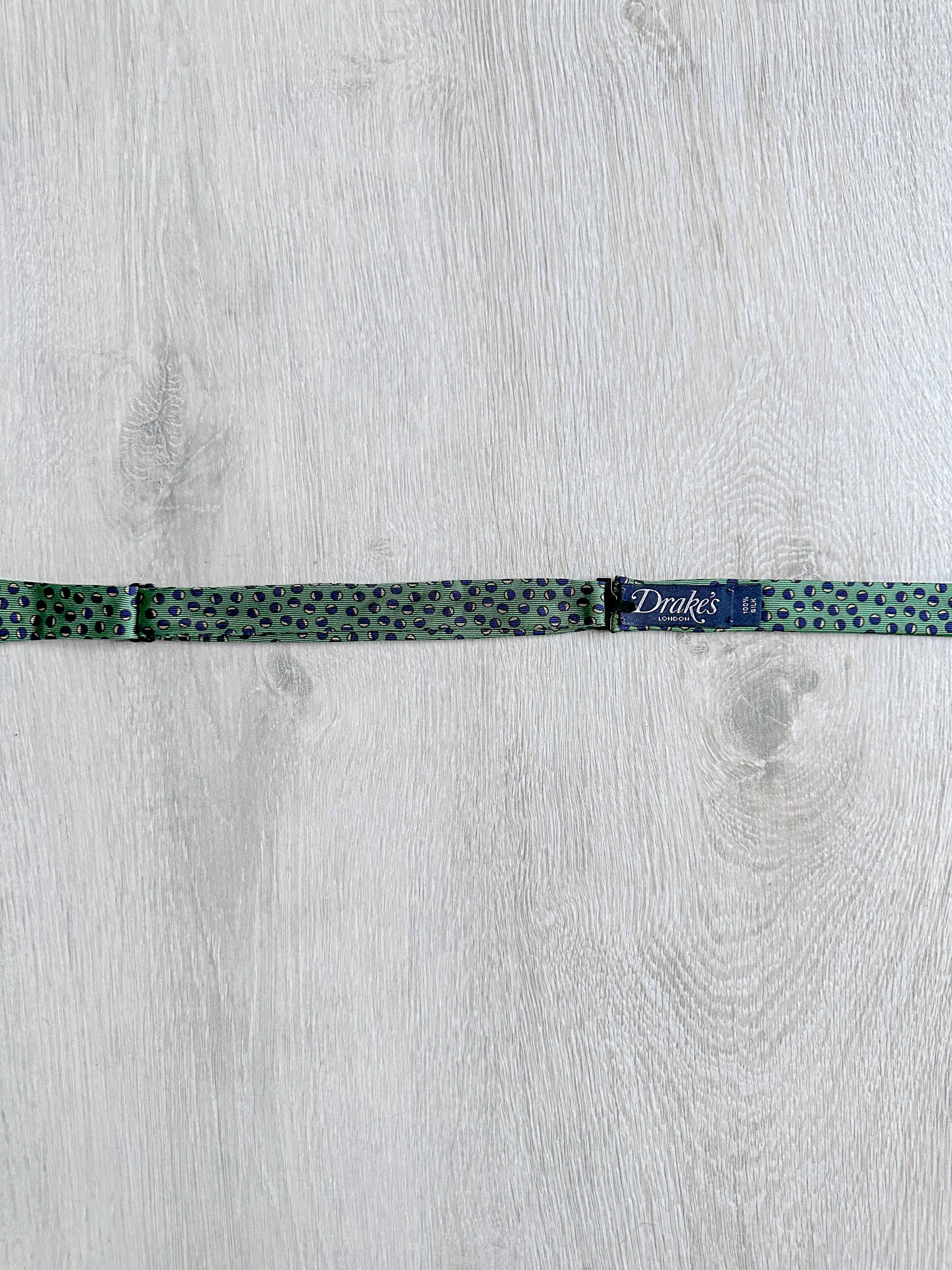 Drake's Green Abstract Circle Foulard Print Self Tie Bow Tie - House Of Huntington