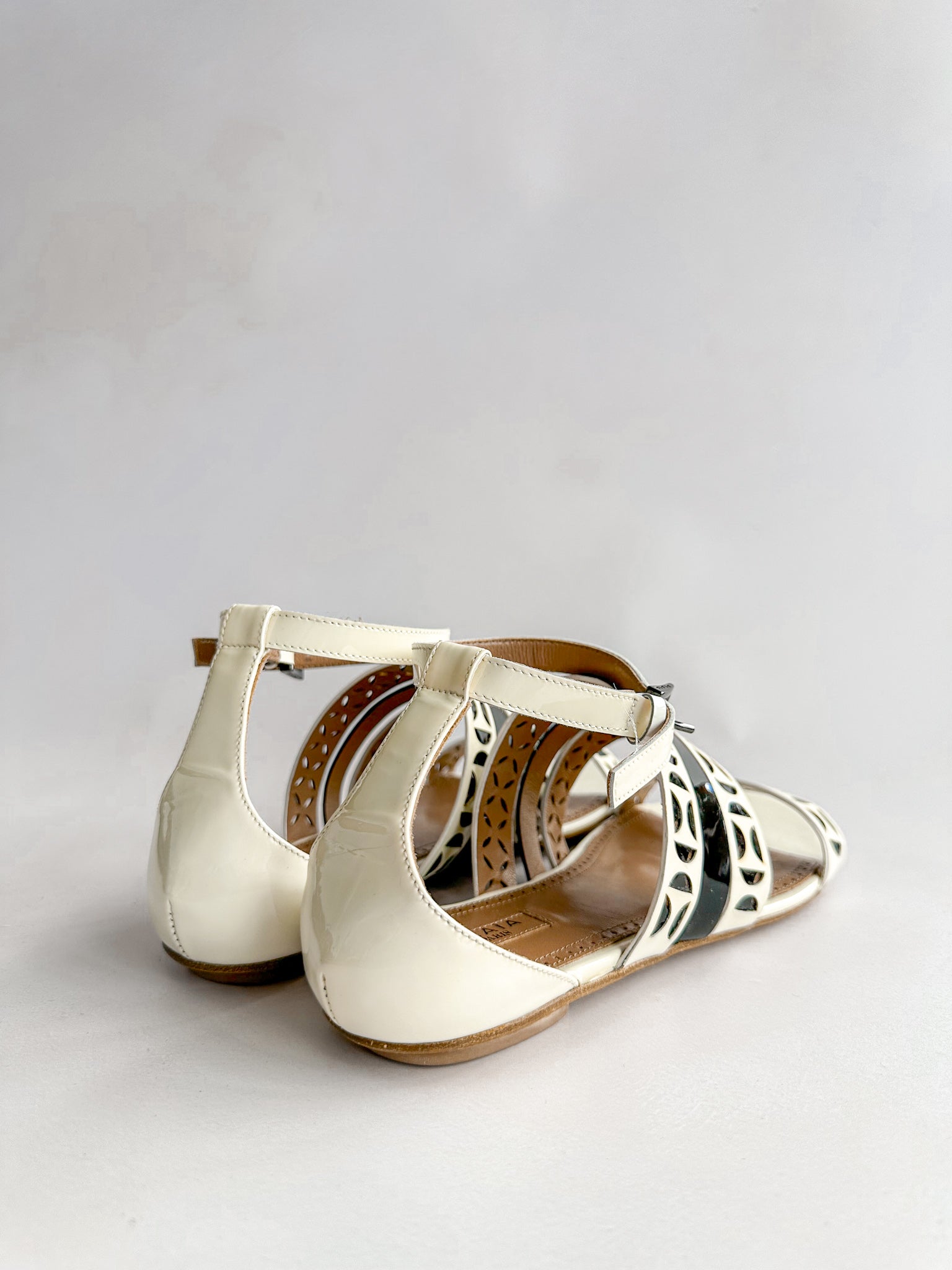 ALAÏA Beige Laser-Cut Leather Sandals