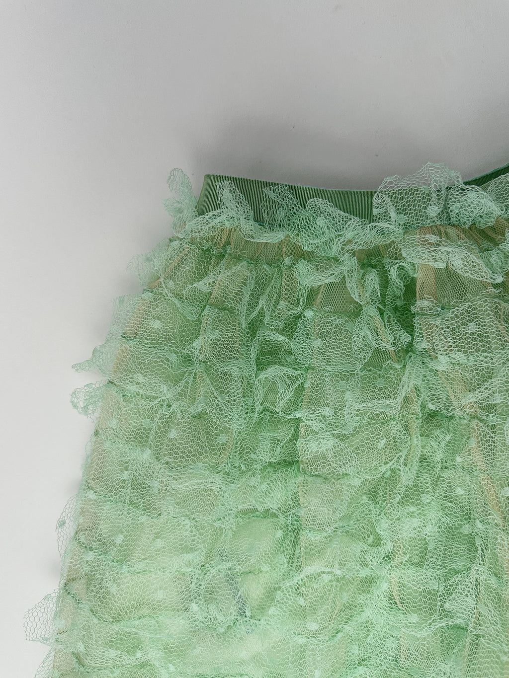 Jupe courte en tulle à volants et dentelle Point d'Esprit vert Red Valentino
