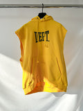 Gallery Dept Yellow sleeveless hoodie with 'DEPT.' text on a white background