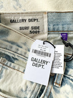 Close-up of Gallery Dept. denim with brand labels and size information.