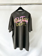 GGallery Dept gray t-shirt with colorful text on a hanger against a white background