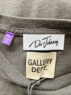 Gray sweatshirt with 'Doc Johnson' and 'Gallery Dept.' labels on a close-up of the collar.