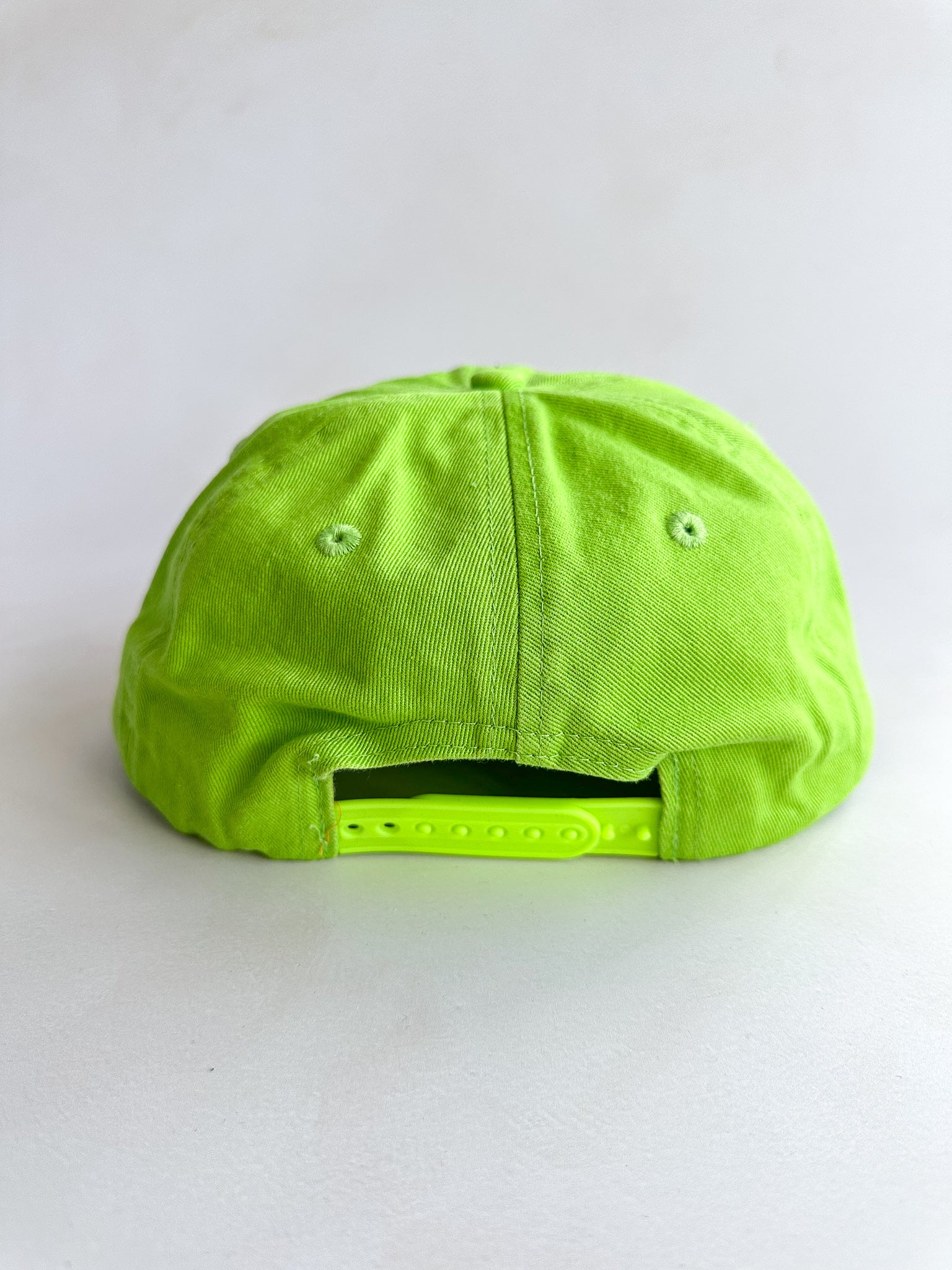 Gallery Dept Neon green cap with 'DEPT.' text on a white background