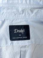 Drake's label on a white shirt with 'Made in Somerset, England' text