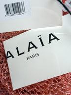 ALAÏA Runway Metallic open-knit midi dress
