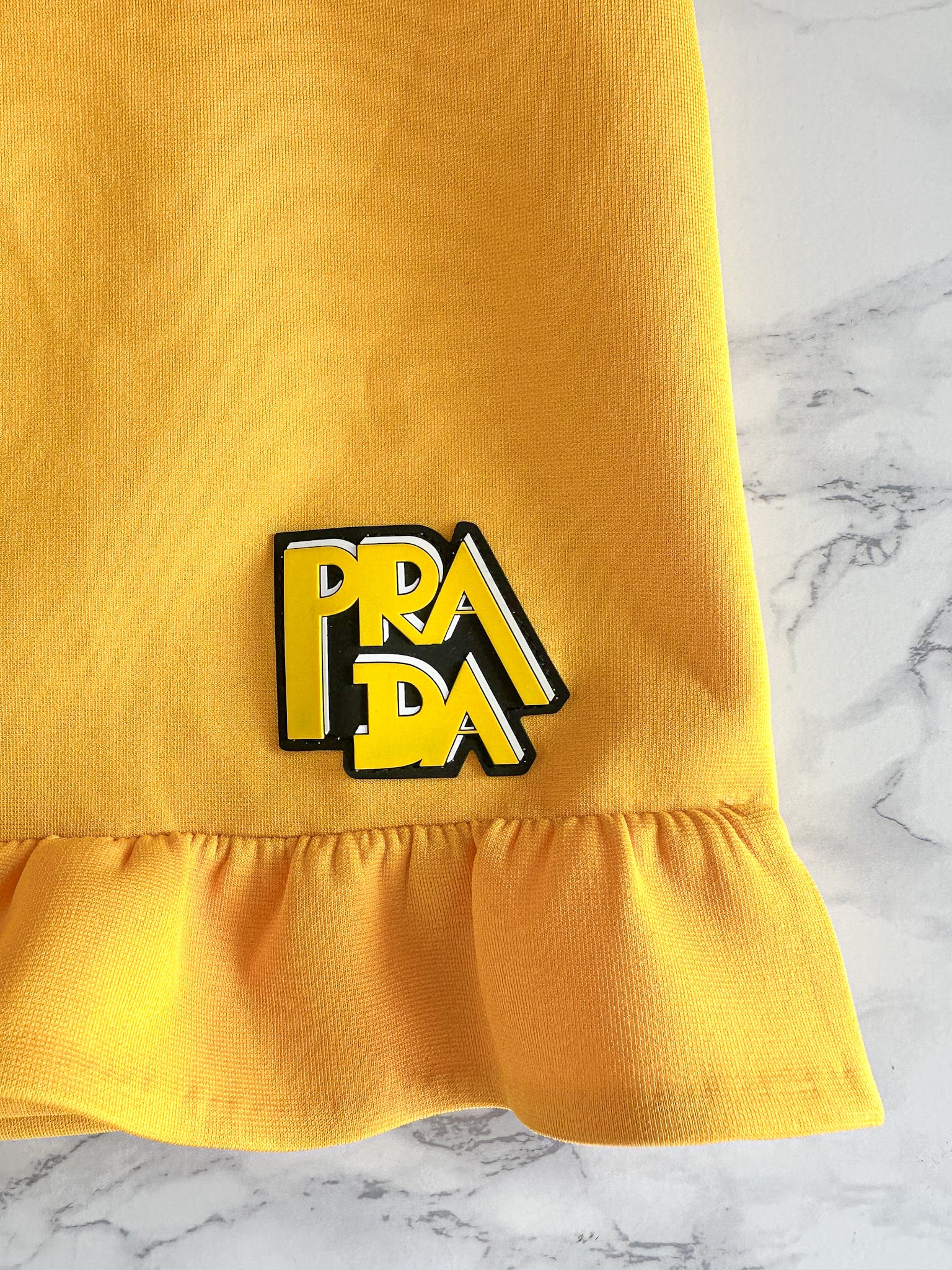 Prada Yellow Ruffle Trim Belted Logo Patch Mini Skirt