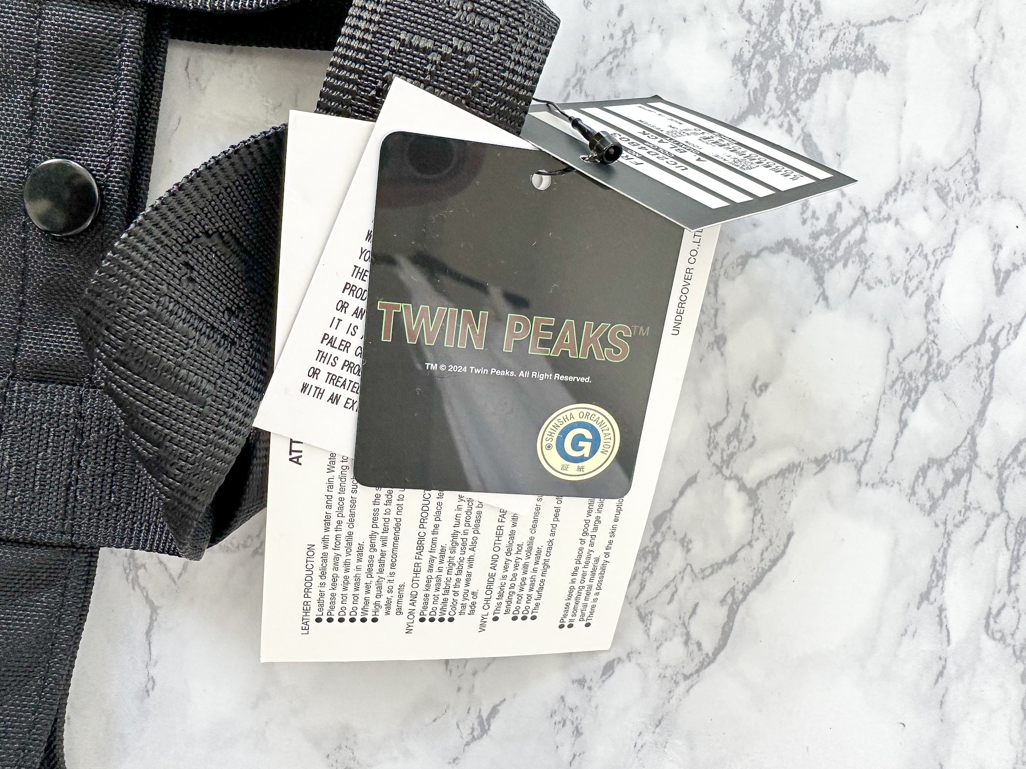 Petit sac fourre-tout Undercover Twin Peaks pour homme avec slogan