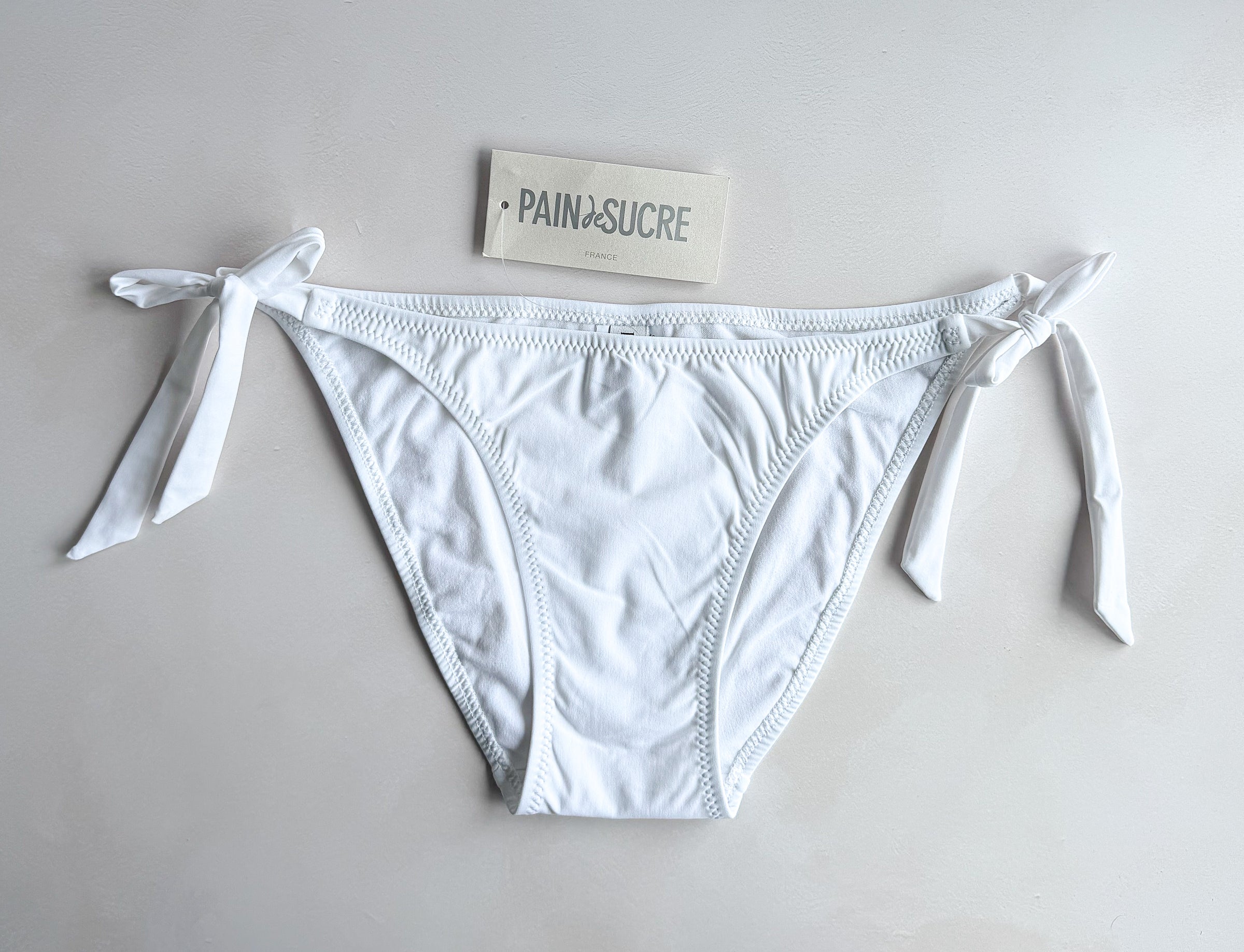 Pain De Sucre White Side Tie Bikini Bottom in Onyx