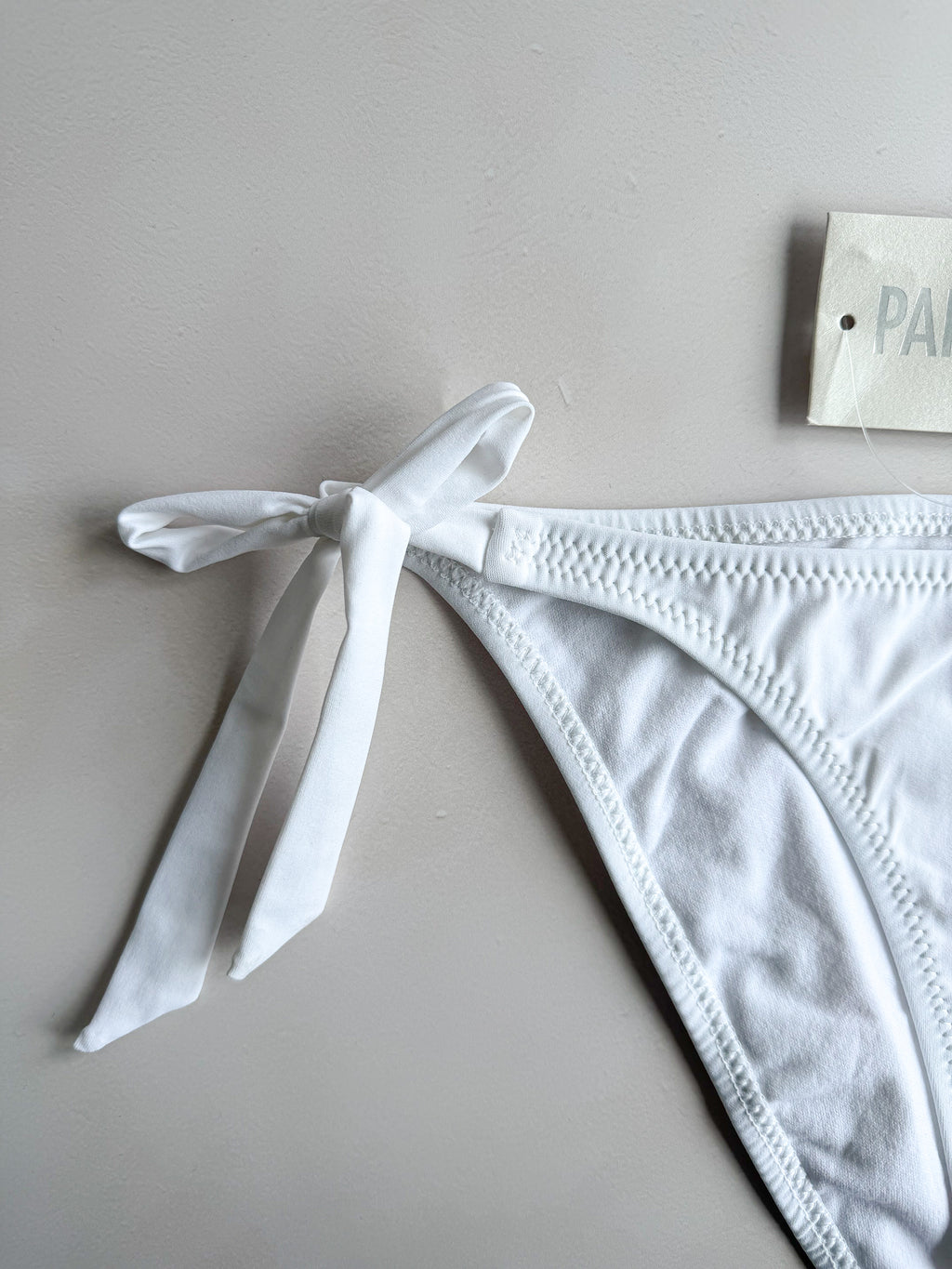 Pain De Sucre White Side Tie Bikini Bottom in Onyx