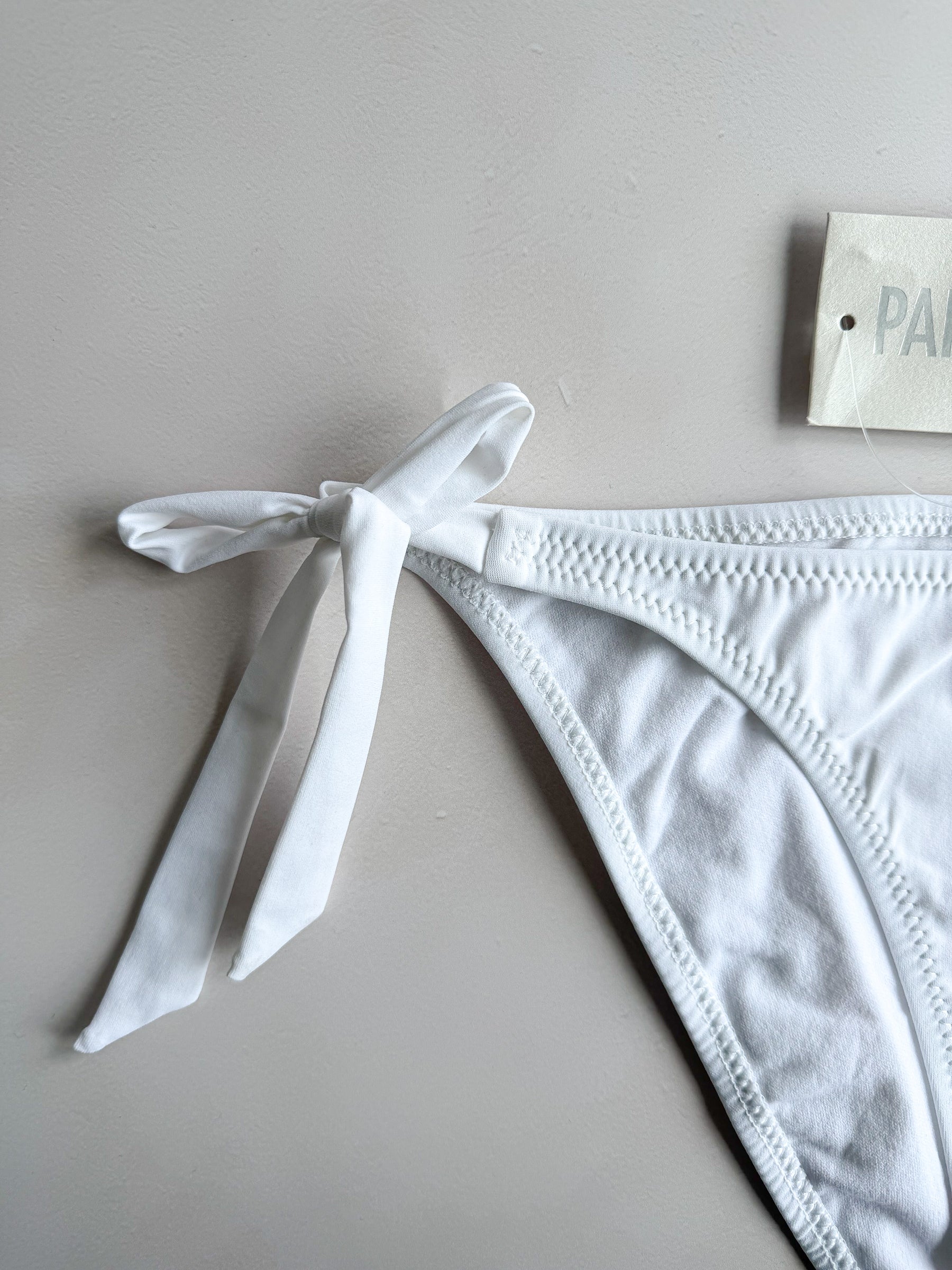 Pain De Sucre White Side Tie Bikini Bottom in Onyx