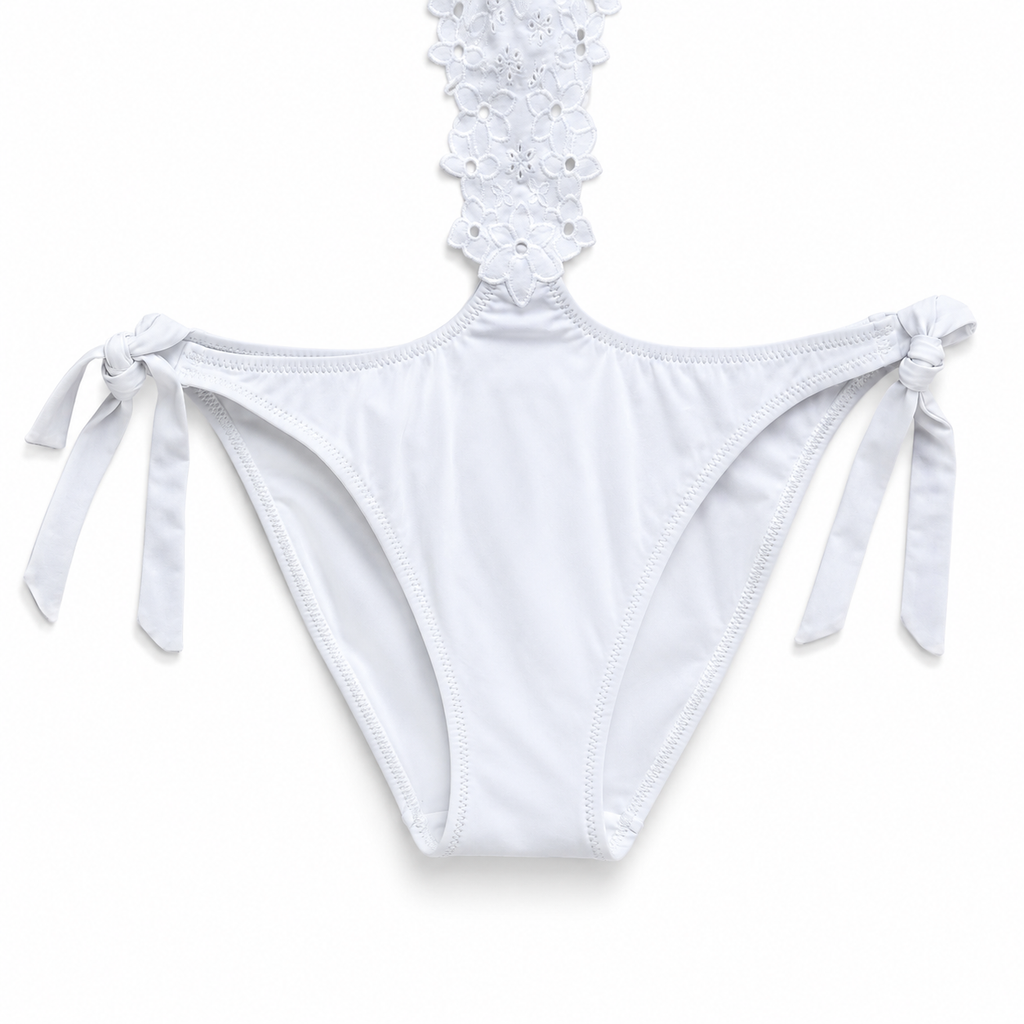 White bikini bottom with lace detailing and tie sides on a white background